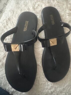 Michael Kors Black Bow Thong Sandals with Gold Plaque